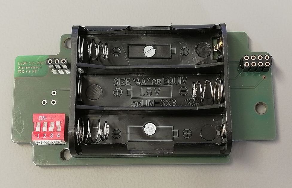 alt: "Beispiel eines Batteriefaches auf einer Platine", w:50